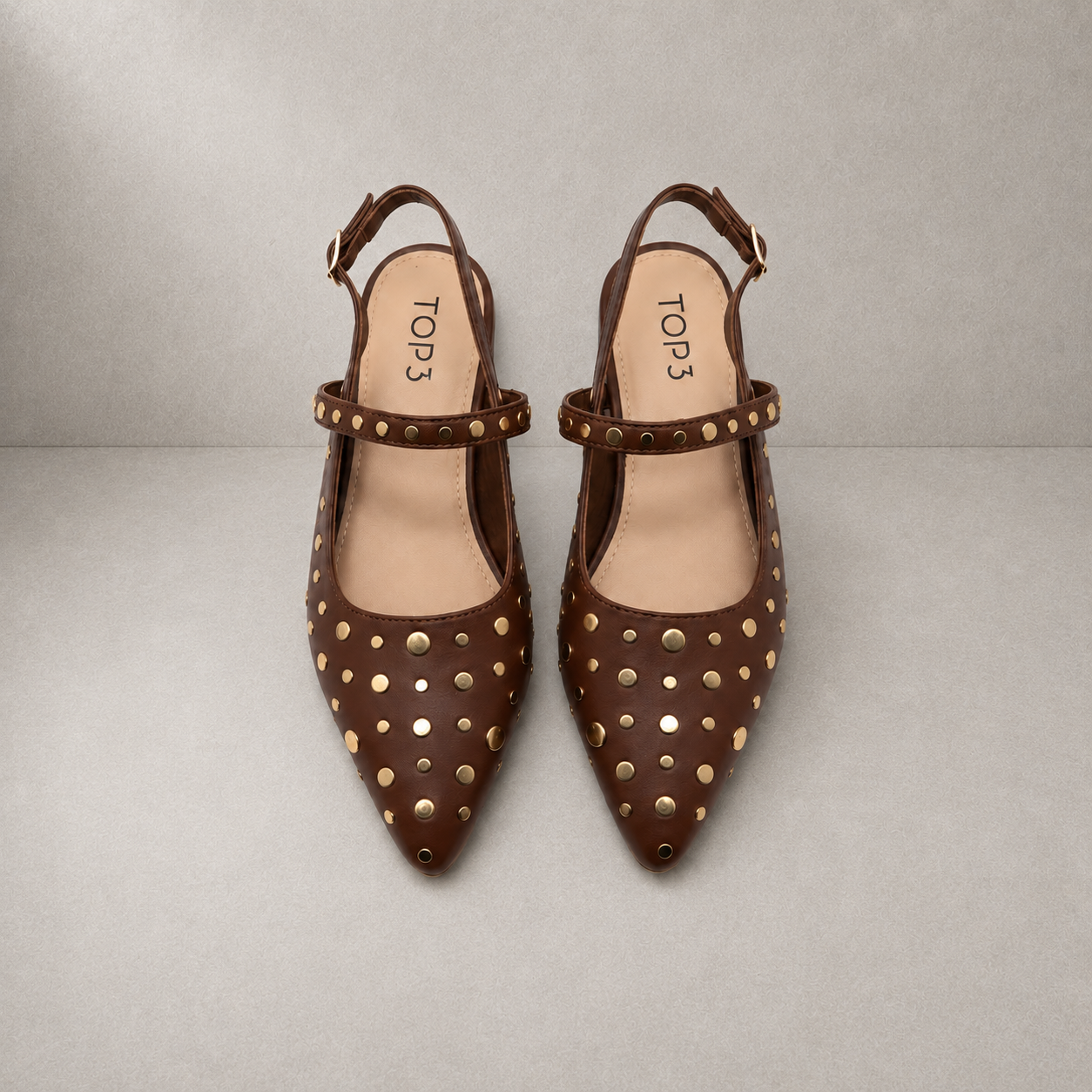 Slingback Borchiata in Pelle