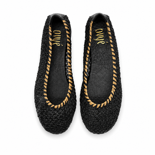 Ballerina nera con bordo dorato